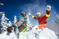 Happy couple of snowboarders having fun Royalty Free Stock Photo