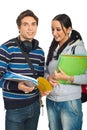 Happy couple of students studying Royalty Free Stock Photo