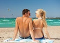 Happy couple in sunglasses on the beach Royalty Free Stock Photo