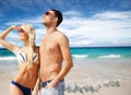 Happy couple in sunglasses on exotic summer beach Royalty Free Stock Photo