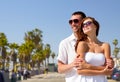 Happy couple in sunglasses over venice beach Royalty Free Stock Photo