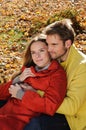 Happy Couple in sunny Autumn Park Royalty Free Stock Photo