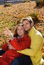 Happy Couple in sunny Autumn Park Royalty Free Stock Photo