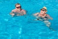 Happy couple in swimming pool Royalty Free Stock Photo