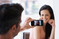 Happy couple, taking picture and love in coffee shop on vacation and wife smile for husband on romantic date. Man Royalty Free Stock Photo