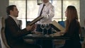 Happy couple talking at restaurant. table. Business couple reading menu in cafe