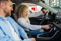 Happy couple in their new car. Royalty Free Stock Photo