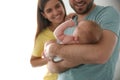 Happy couple with their newborn baby at home Royalty Free Stock Photo