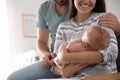 Happy couple with their newborn baby at home Royalty Free Stock Photo