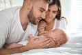 Happy couple with their newborn baby at home Royalty Free Stock Photo