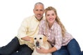 Happy couple with their pet dog Royalty Free Stock Photo