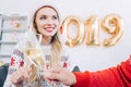 happy couple toasting with champagne glasses and celebrating 2019 Royalty Free Stock Photo