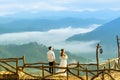 Happy couple together on romantic wooden bridge Royalty Free Stock Photo