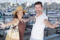 happy couple tourists at port