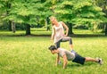 Happy couple training in the park