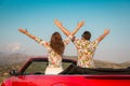 Happy couple travel by car in the mountains Royalty Free Stock Photo