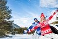 Happy couple travel by car in winter Royalty Free Stock Photo