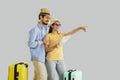 Happy couple traveler with map planning honeymoon vacation trip studio shot Royalty Free Stock Photo