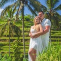 Happy couple traveling at Bali, rice terraces of Tegalalang, Ubud Royalty Free Stock Photo