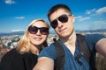 Happy couple traveling at the city and making selfie Royalty Free Stock Photo