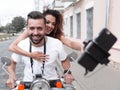 Happy couple traveling on motorcycle.Travel concept Royalty Free Stock Photo