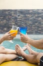 Happy couple with two glasses of orange juice. Royalty Free Stock Photo