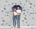 Happy couple with umbrella standing money rain Royalty Free Stock Photo