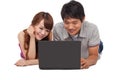 Happy couple using laptop Royalty Free Stock Photo