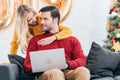 happy couple using laptop at home Royalty Free Stock Photo