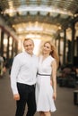 Happy couple walk in the centre of the city. Wiena, Austria