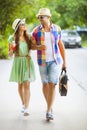Happy couple walking with guitar Royalty Free Stock Photo