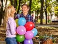 Happy couple walking in the park. Royalty Free Stock Photo