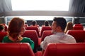 Happy couple watching movie in theater or cinema Royalty Free Stock Photo