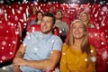 Happy couple watching movie in theater Royalty Free Stock Photo