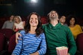 Couple watching movie in theatre Royalty Free Stock Photo