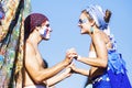 Happy Couple Wearing Costumes and Holding Hands at Carnaval in Rio de Janeiro, Brazil