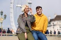 Happy couple by westminster bridge, River Thames, London. UK. Royalty Free Stock Photo