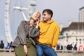 Happy couple by westminster bridge, River Thames, London. UK. Royalty Free Stock Photo