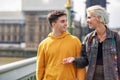 Happy couple by westminster bridge, River Thames, London. UK. Royalty Free Stock Photo