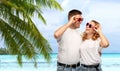 Happy couple in white t-shirts and sunglasses Royalty Free Stock Photo