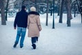 Happy Couple in Winter Park having fun. Royalty Free Stock Photo