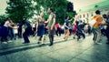 Happy couples dancing lindyhop on public street event.