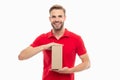 Happy courier holding cardboard box. Courier guy isolated on white. Courier service