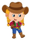 The happy cowboy girl is holding the rope and ready for catching Royalty Free Stock Photo