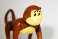 Happy crawling toy monkey in plastic