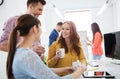 Happy creative team drinking coffee at office Royalty Free Stock Photo