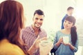 Happy creative team drinking coffee at office Royalty Free Stock Photo