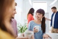 Happy creative team drinking coffee at office Royalty Free Stock Photo