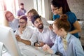 Happy creative team in office. Business, startup, design, people and teamwork concept Royalty Free Stock Photo