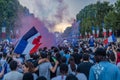 Happy crowd celebrating the victory on the Champs Elysees Avenue in Paris after the 2018 World Cup Royalty Free Stock Photo